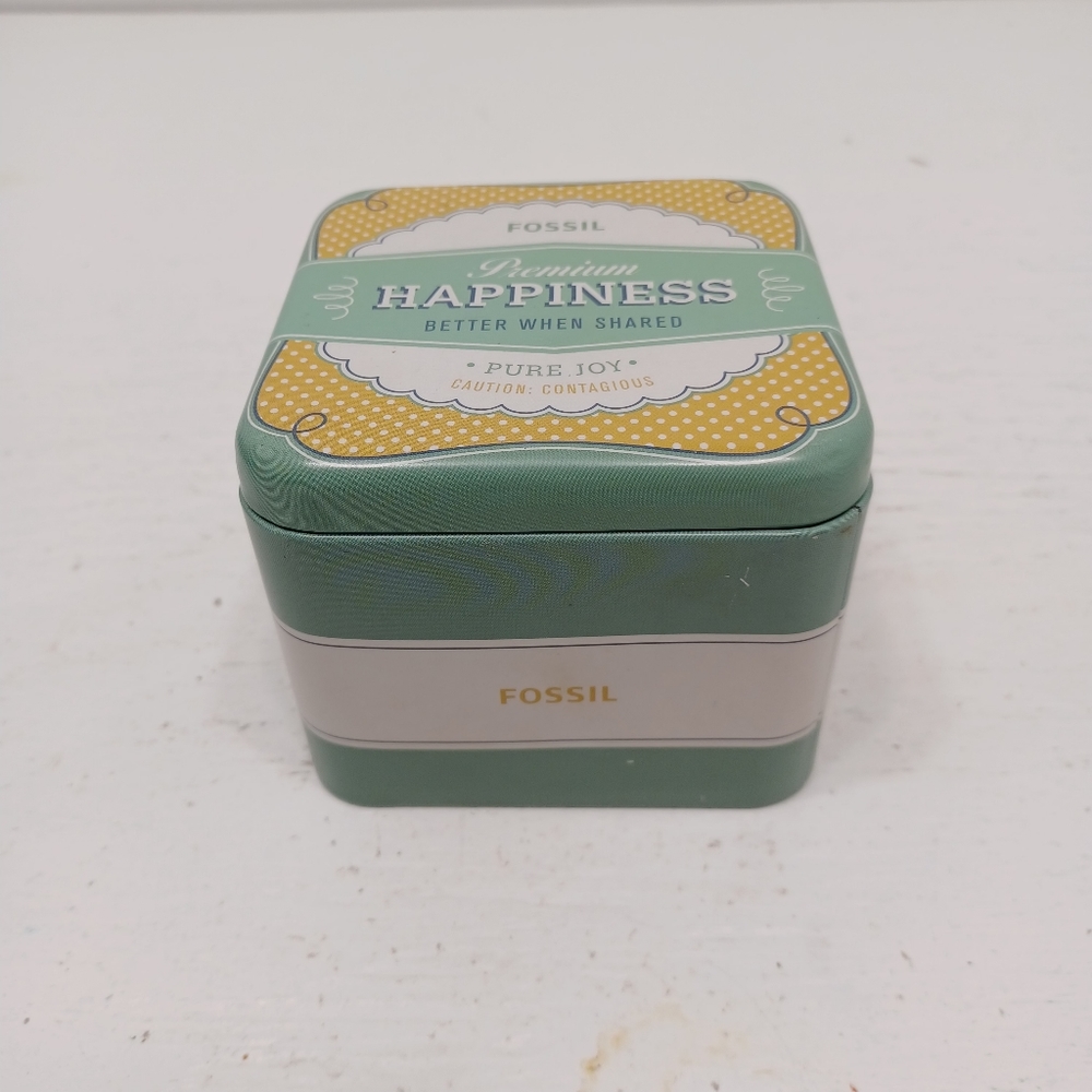 Fossil Tin Book. Storage tin. Fossil